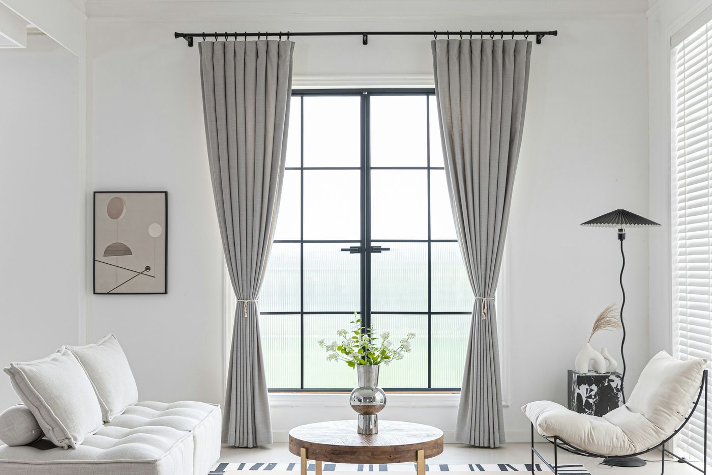 Gray drapes on a living room window
